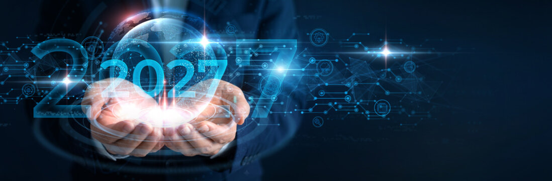 Confident Businessman Showing 2027 Text for Strategic Planning and Future Enterprise Success