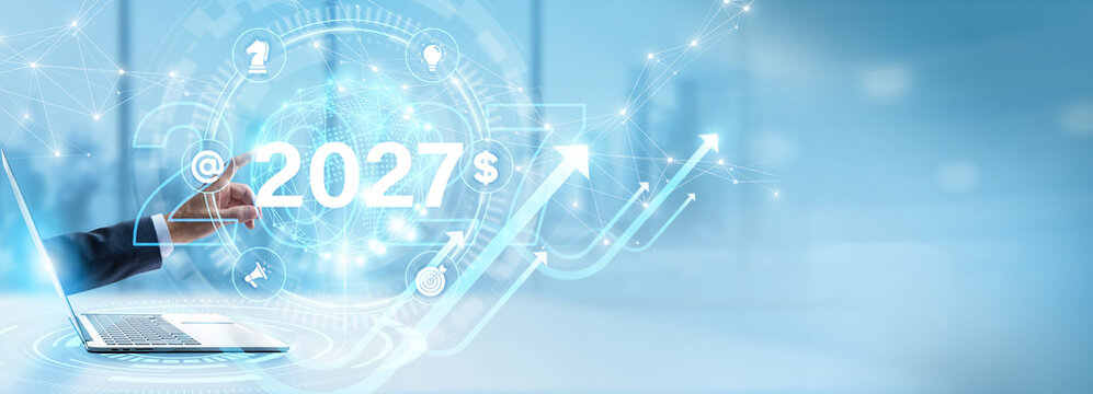 Futuristic Business Growth Concept with Businessman Interacting with 2027 Data Analytics