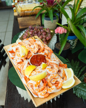 Shrimp Cocktail Platter with Lemon and Dipping Sauce for Catering