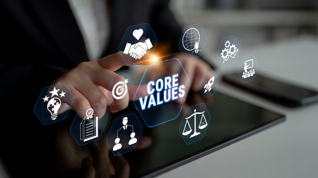 Business Professional Interacting with Core Values Icons on Tablet Screen in Modern Office Environment Fluxor.