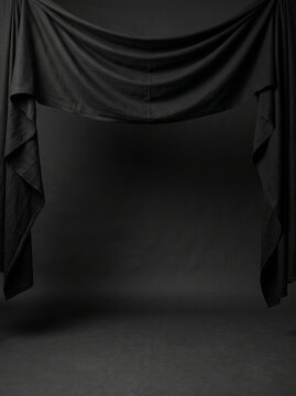Elegant Black Draped Fabric Frame on Dark Background with Copy Space