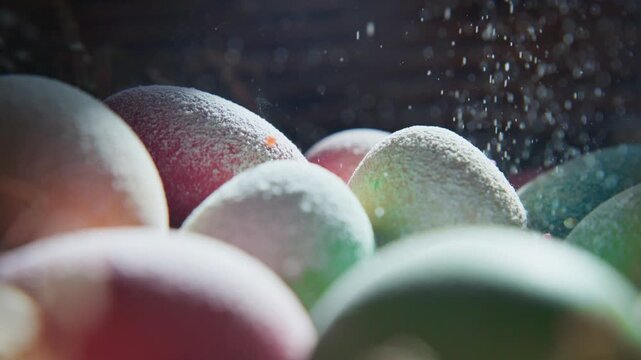 Frosted mangoes glisten softly in slow motion. Dewy droplets float around vibrant, chilled fruit. Cozy, crisp atmosphere evokes winter freshness. Ideal for food, seasonal, or cozy lifestyle content