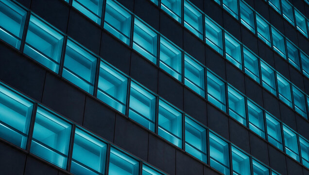 Modern Office Building Facade with Glowing Windows