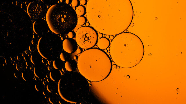 Orange and black abstract liquid bubbles