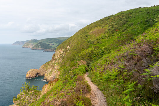 View from the south west coast path of the North Devon coastline at Woody Bay