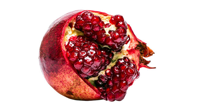 Isolated fresh ripe pomegranate fruit cut open revealing sweet juicy red seeds and vibrant arils