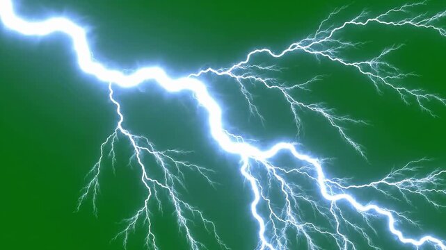 Slow motion tracking shot of lightning bolt branching and striking across green background sky during storm