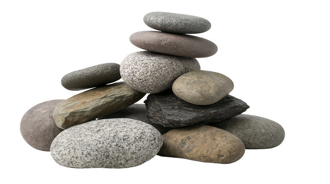 Isolated smooth natural river stones arranged in a balanced stack and loose pile for calm zen meditation