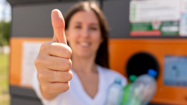 Bottle recycling concept with woman near return station.