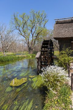 Water mill on a river, Daio Wasabi Farm, Nagano, Japan