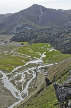 View over the Laugahraun lava field with cabins and a camping site, Landmannalaugar, Southern Region, Iceland