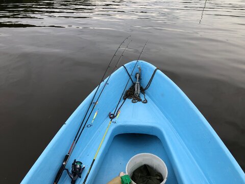 bow of a fishing boat rocks on the waves. Fishing gear in the boat