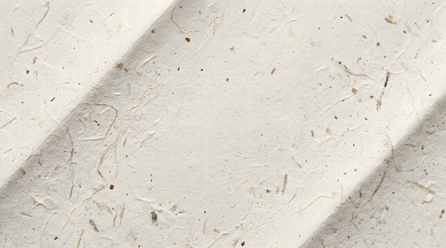 Off-white handmade recycled paper texture with visible organic plant fibers, flecks, and diagonal embossed ridges across the surface