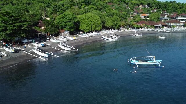 Outrigger boats on the black beach of Amed, Amed Bali, Indonesia
