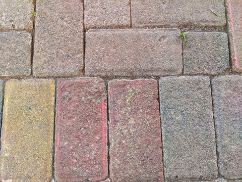 Top view texture of colorful rectangular paving stones on walkway