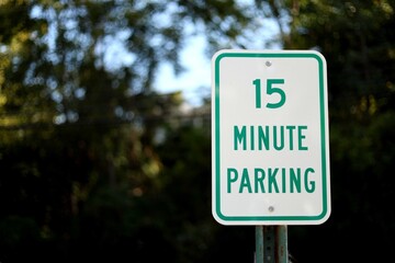 15 Minute Parking Restricted Area Street Sign with Negative Copy Space. © Mohamed