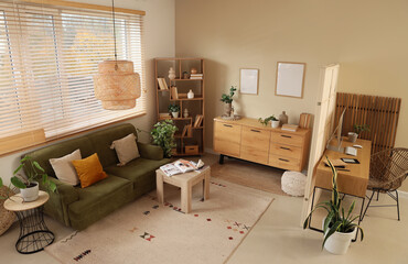 Remote work and home office interior, modern living room with workspace and green sofa for freelance lifestyle and comfortable residential design © Pixel-Shot