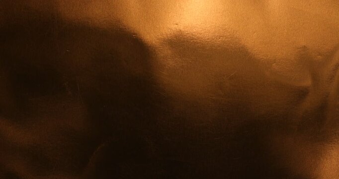 Abstract shimmering golden bronze texture background with elegant