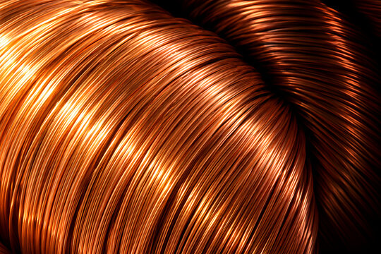 巻かれた銅線が暖かな光で輝く背景 / Tightly Coiled Copper Wire Glowing in Warm Light Background