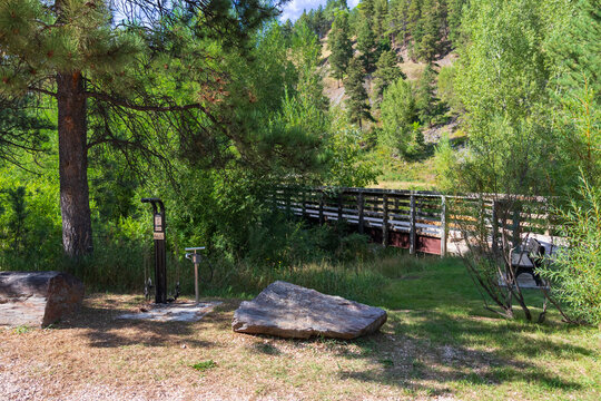 Bike repair station with East Fantail Bridge No. F5 in the background on the George S. Mickelson Trail, South Dakota