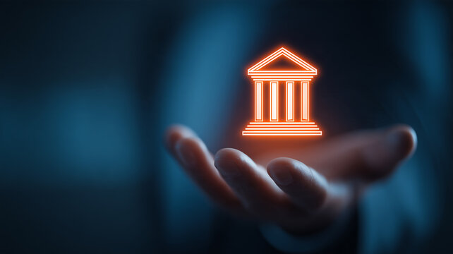 An open hand supporting a holographic bank building represents digital banking services and financial security in modern institutions.