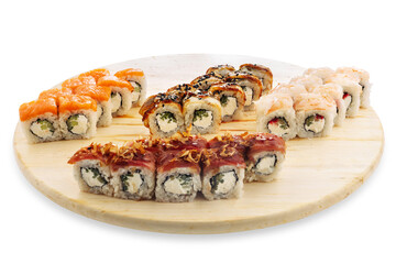 Assorted sushi rolls with salmon, sesame, and toppings arranged on a round wooden serving board isolated against a white background © Кирилл Горшков