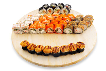 Assorted sushi rolls arranged on a round wooden serving board with salmon, vegetables, sesame coating, and grilled toppings, isolated food presentation © Кирилл Горшков