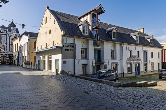 Valkenburg, Netherlands, October 04, 2026. The historic Fransche Molen building along a paved cobblestone street in the center of Valkenburg.
