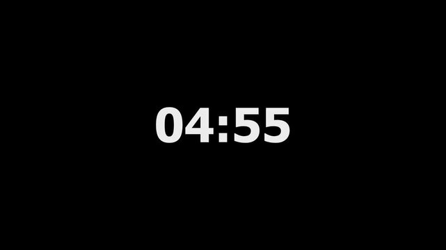 White digital clock numbers counting down on black background video footage