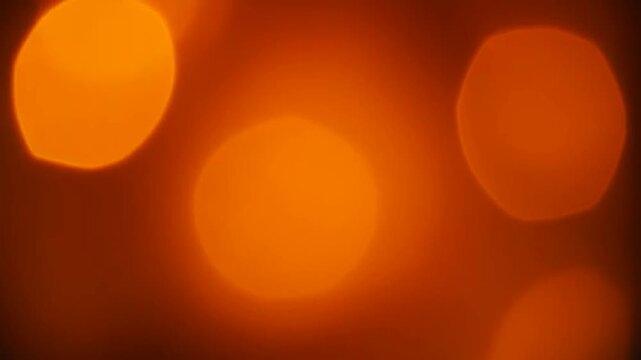 Abstract Orange Bokeh Background Featuring Glowing Light Circles And Warm Blur Effect For Illumination