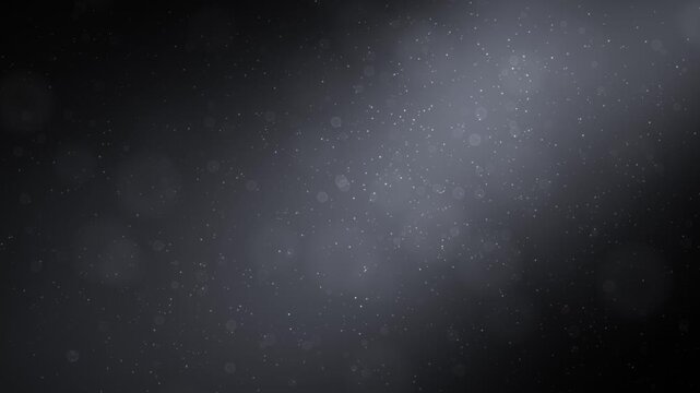 Dust particles illuminated by light, creating a mystical and atmospheric bokeh effect, perfect for abstract backgrounds or overlay.