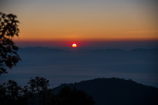 Landscape mountain green field meadow white cloud blue sky sunrise. Amazing landscape fog mountain clouds scenery. Beautiful Mountain landscape foggy windy range green asian farm