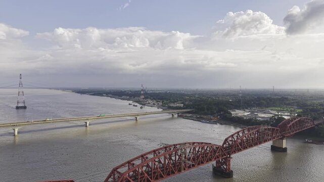 Aerial view of two bridges crossing a wide river