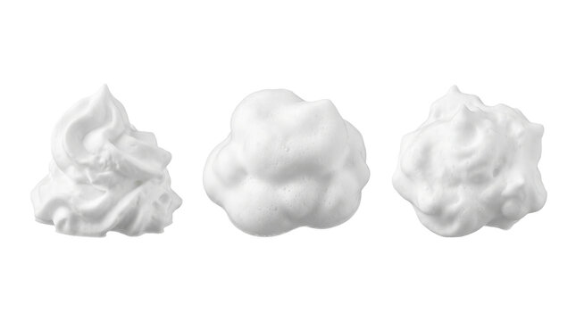 White cosmetic foam dollops in three different shapes represent shaving cream or whipped texture for product packaging and design.