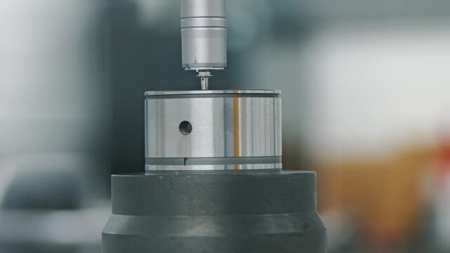Robotic Automation with precise control quality testing CNC metal part In Engineering test Laboratory, close up macro video