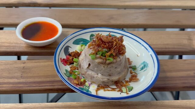 Steamed yam taro cake, ready to eat. Served on table in a restaurant.