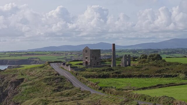 Drone orbit Tankardstown Mines Copper Coast Drive old mine works on the sea cliffs closed for many years now a tourist attraction in Waterford Ireland