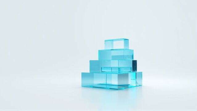 Pyramid structure built from translucent blue cubes. Minimalist composition, clean background, soft lighting creates subtle shadows.