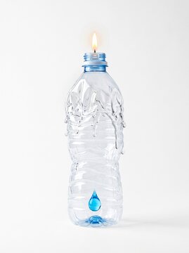 Melting plastic water bottle burning like candle with single water drop inside, resource scarcity and climate risk concept on white background
