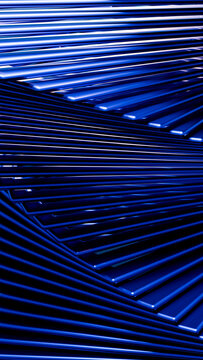 Stacked blue metal sheets with parallel angled arrangement