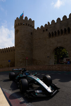BAKU, AZERBAIJAN - SEPTEMBER 2026: Mercedes-AMG F1 Team car navigates the tight Old City castle section during the Azerbaijan Grand Prix