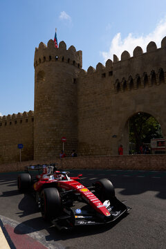 BAKU, AZERBAIJAN - SEPTEMBER 2026: Scuderia Ferrari F1 Team car turns through the narrow Old City castle section during the Azerbaijan Grand Prix
