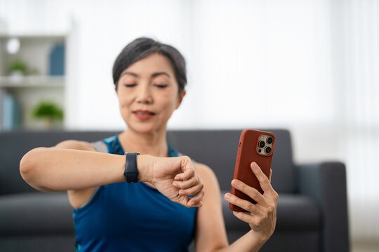 Home Workout. Woman Checking Smart watch.