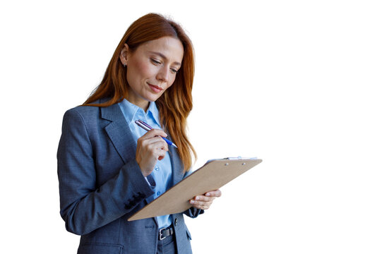 Professional businesswoman writing on clipboard, planning future tasks