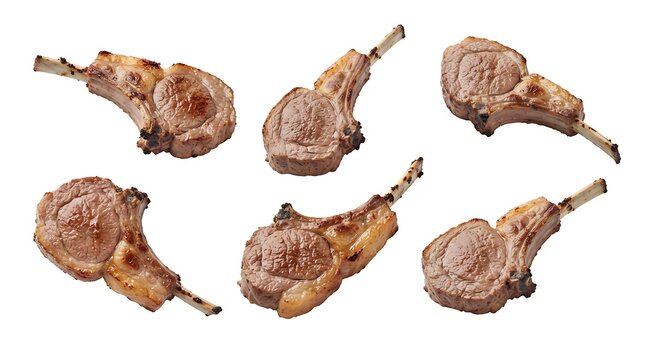 A collection of six grilled lamb chops with bones, showing charred marks and cooked meat, arranged on a white background, culinary and restaurant menu