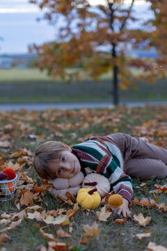Cute child in the park autumn time