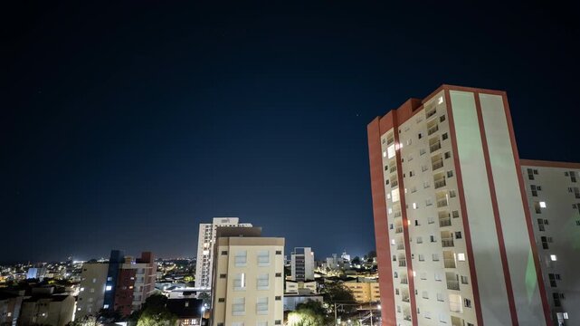 White Residential Tower Rising Above S o Carlos at Night