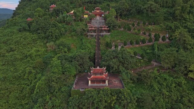 Aerial view flying away from truc lam phat tich pagoda in vietnam