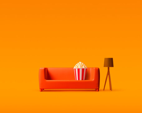 Popcorn on a miniature sofa for movie night entertainment