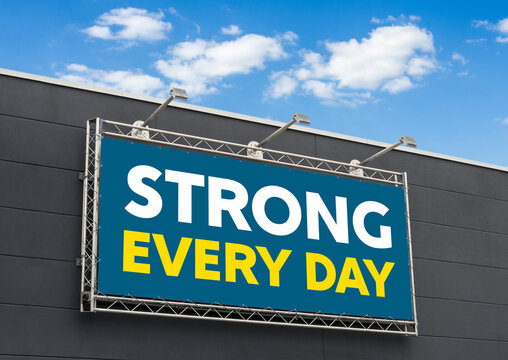 Strong Every Day written on a billboard